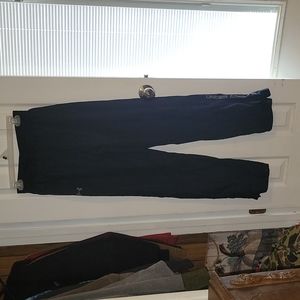 Under Armour men's loose fit heatgear pants, size medium